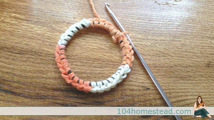 Mason jar feeders and waterers are great, but they can be hard to hang. Here is an easy crochet holder that will keep your feeder and waterer off the ground.