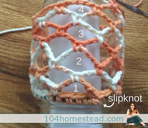 Mason jar feeders and waterers are great, but they can be hard to hang. Here is an easy crochet holder that will keep your feeder and waterer off the ground.