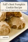 Close-up of chewy pumpkin cookies drizzled with maple glaze on a white plate with a blue napkin.