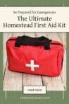 A red first aid kit with a white cross symbol sitting on a wooden surface, designed for homestead emergency preparedness.