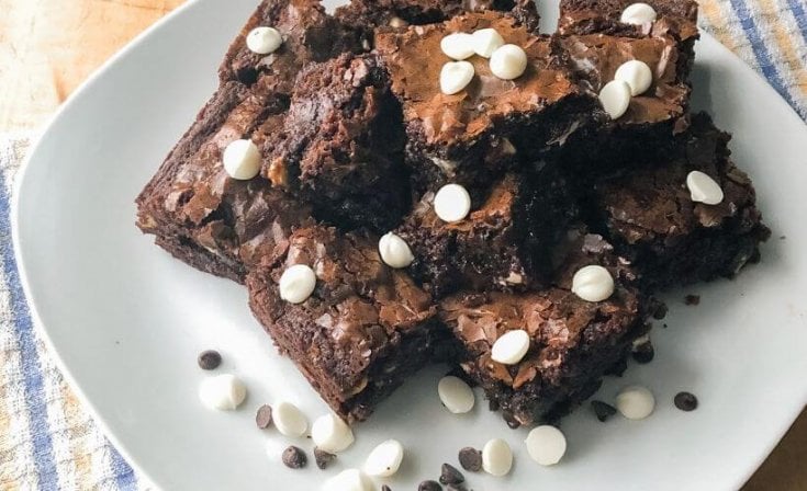 This triple chocolate brownie recipe works up really fast. 30 minutes tops! It's really no harder than box mix, but it tastes SO MUCH better than anything you're going to find in a box. It's dark, rich, chewy, gooey and it doesn’t use a block or two of chocolate, so you can convince yourself it's "healthy."