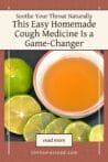 A warm cup of herbal cough syrup surrounded by fresh limes—homemade cold and flu relief.