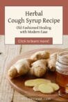 Fresh ginger root and a small jar of honey on a wooden cutting board—ingredients for a DIY herbal syrup.