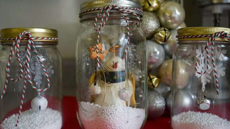 Little snow globes filled with Christmas stuff and faux snow.