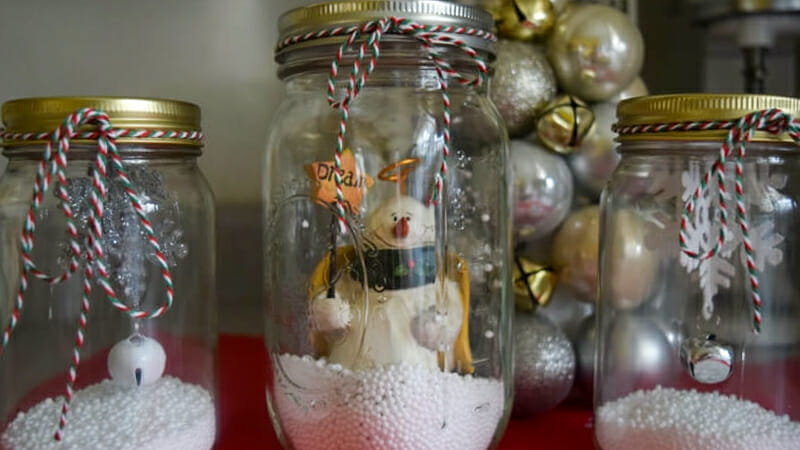 Little snow globes filled with Christmas stuff and faux snow.