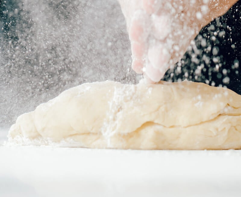 Flouring bread dough.
