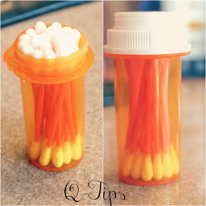 Two views of a pill bottle filled with cotton swabs.