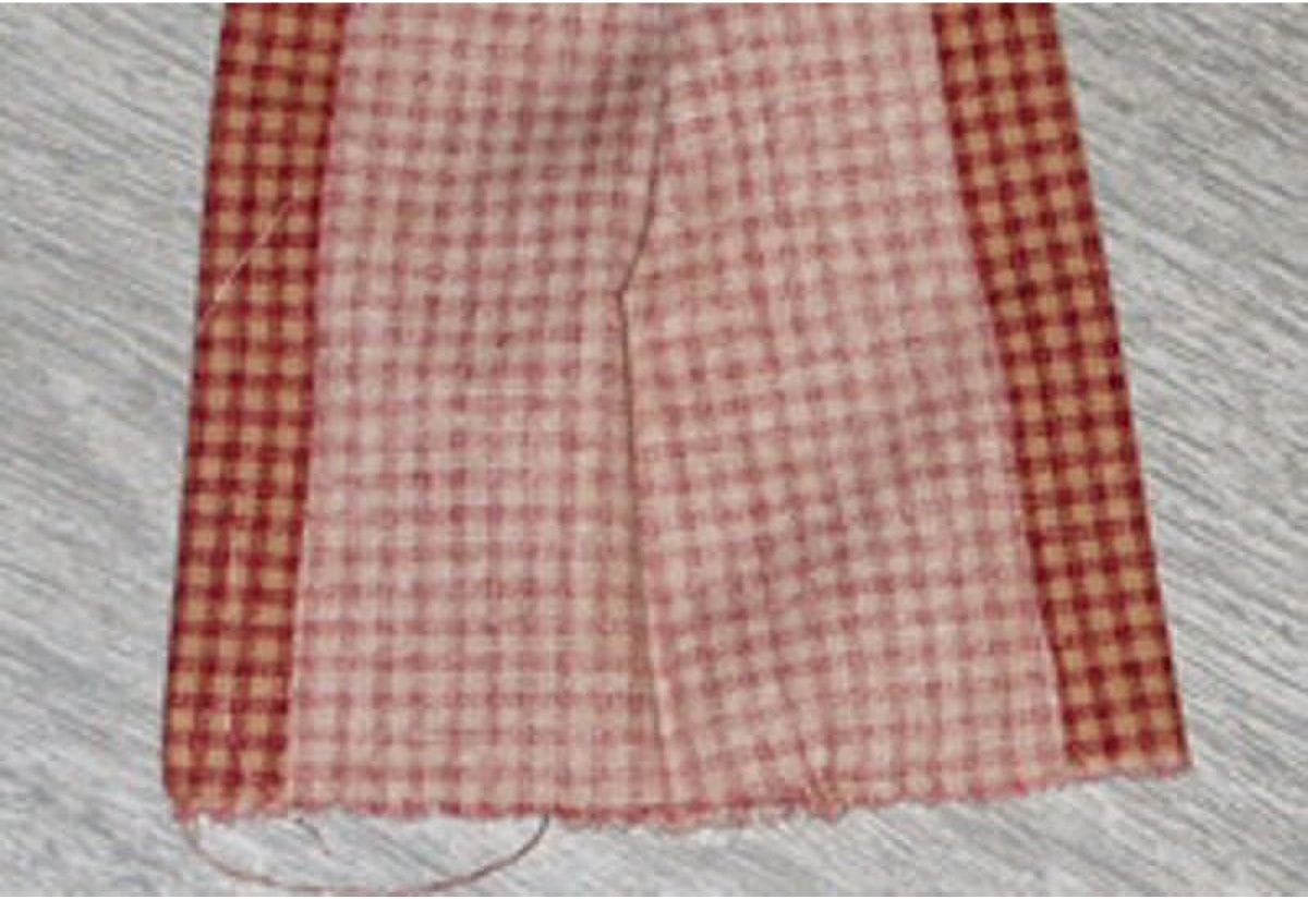 Waistband strip for DIY harvest apron ironed flat and ready for attaching.