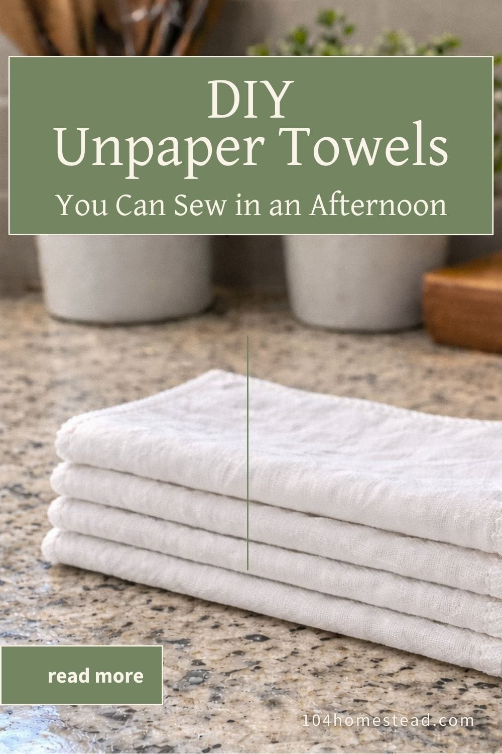 Folded white flour sack unpaper towels stacked on a kitchen countertop with neutral decor in the background, overlaid with text reading “DIY Unpaper Towels You Can Sew in an Afternoon” and a small “read more” button.