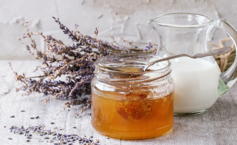 The ingredients for a relaxing milk and honey bath soak.