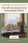 A cozy journaling nook with a warm drink, open notebook, and mountain view, perfect for a homesteader's quiet morning ritual.