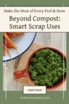 A bowl of bright green carrot top pesto next to roasted carrots on a wooden table with a fork.