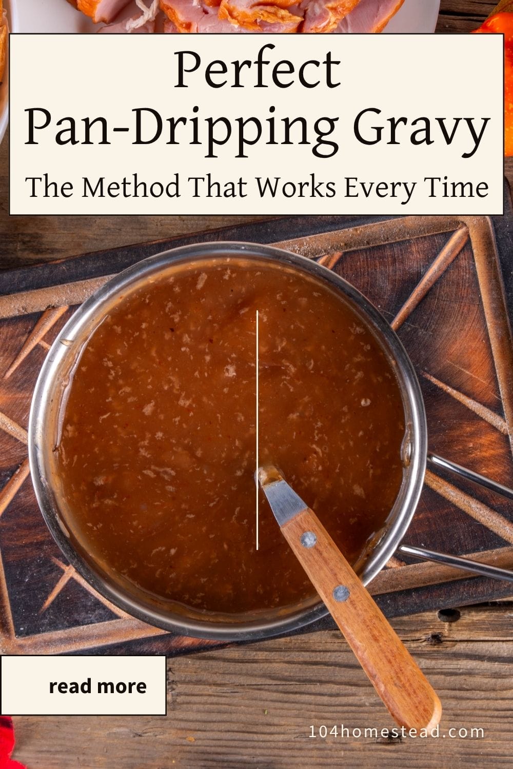 Pot of homemade pan-dripping gravy on a wooden board with holiday sides, with text overlay that reads ‘Perfect Pan-Dripping Gravy: The Method That Works Every Time.’